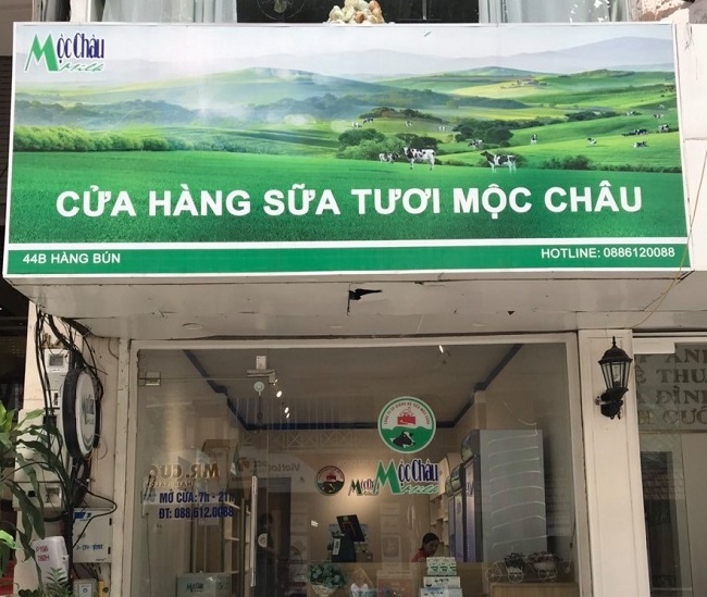 Biển hiệu cửa hàng bán sữa 