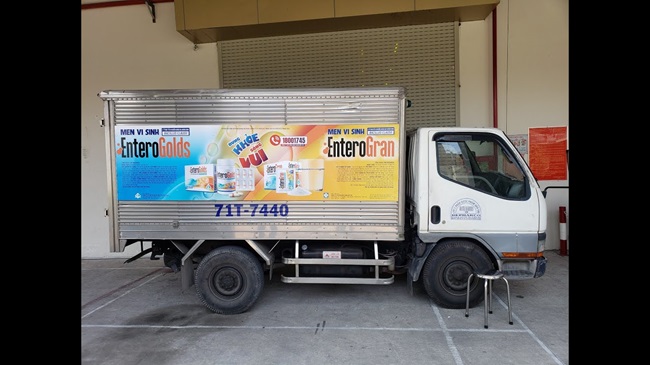 dán decal quảng cáo trên xe tải 